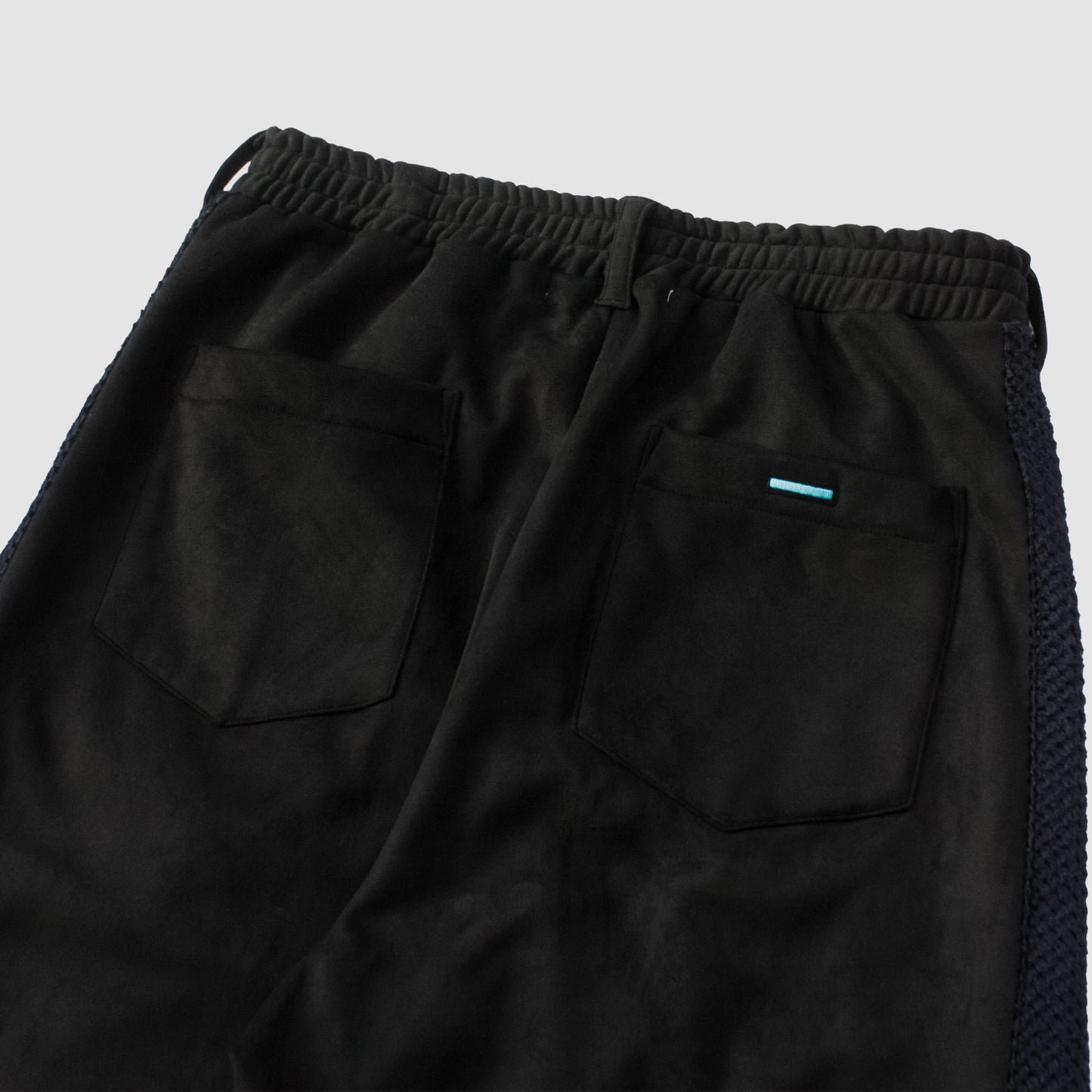 MUZE TURQUOISE LABEL - SWITCHING TRACK PANTS(BLACK)ミューズ 2023年秋冬 トラック パンツ ブラック