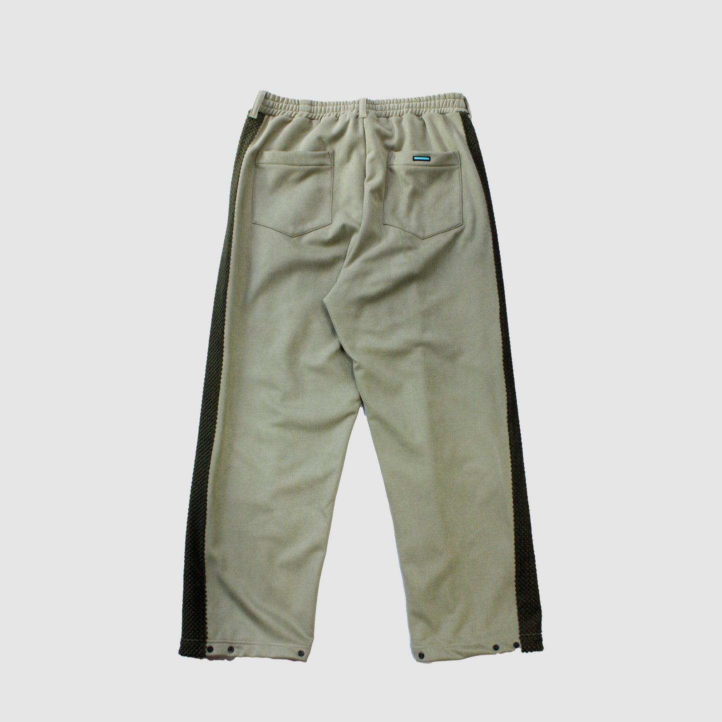 MUZE TURQUOISE LABEL - SWITCHING TRACK PANTS(L.KHAKI)ミューズ トラック パンツ ライト カーキ