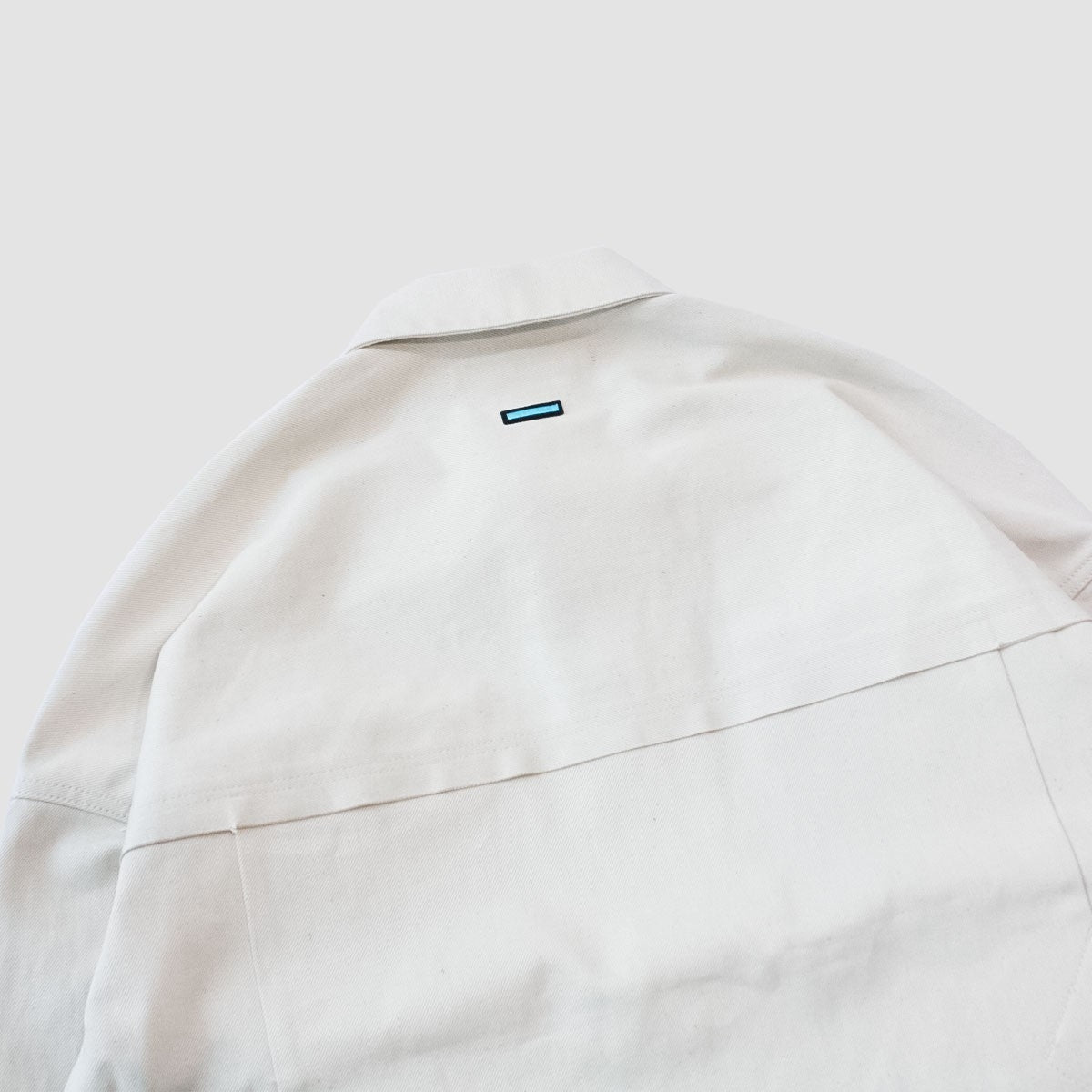 MUZE TURQUOISE LABEL - HEM SLIT WIDE DENIM JACKET(WHITE)ミューズ